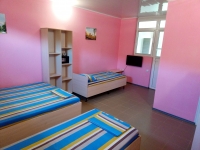 Гостевой дом «Донбас» - номер Семейный с кухней-студией фото