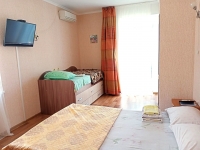 Апартаменты «Snug House» - номер Апартамент «Оранж» – для семьи или компании фото 2